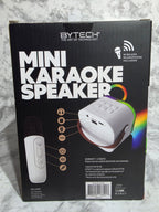 Box for a Bytech Mini Karaoke Speaker on a gray surface