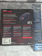 Gaming mouse package with 'Cobra Raptor' branding on a marble surface