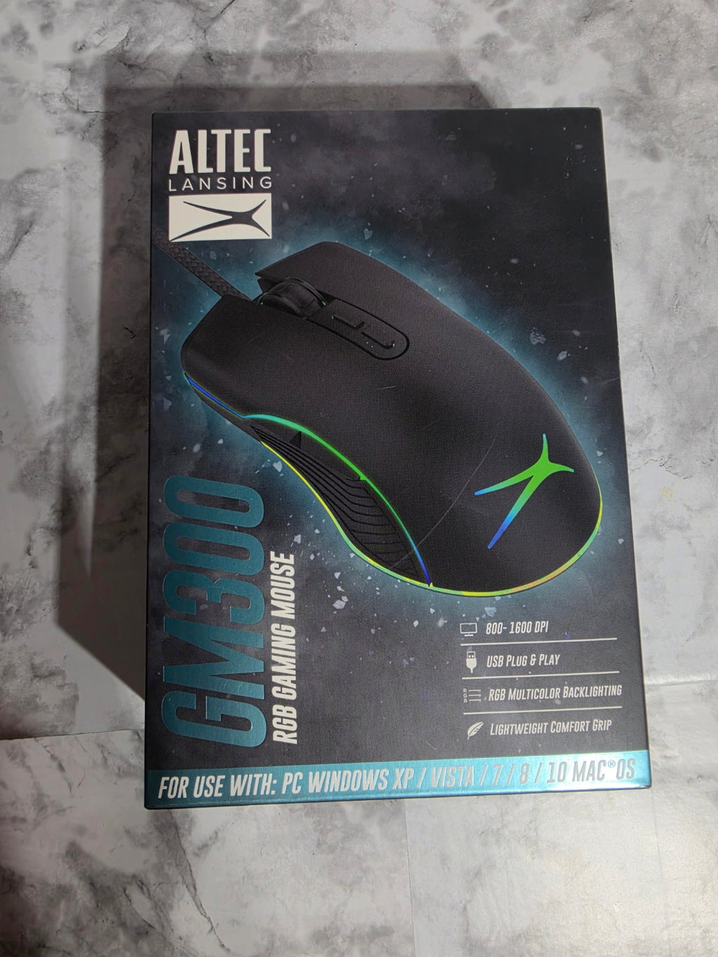Altec Lansing RGB gaming mouse box on a gray marble surface