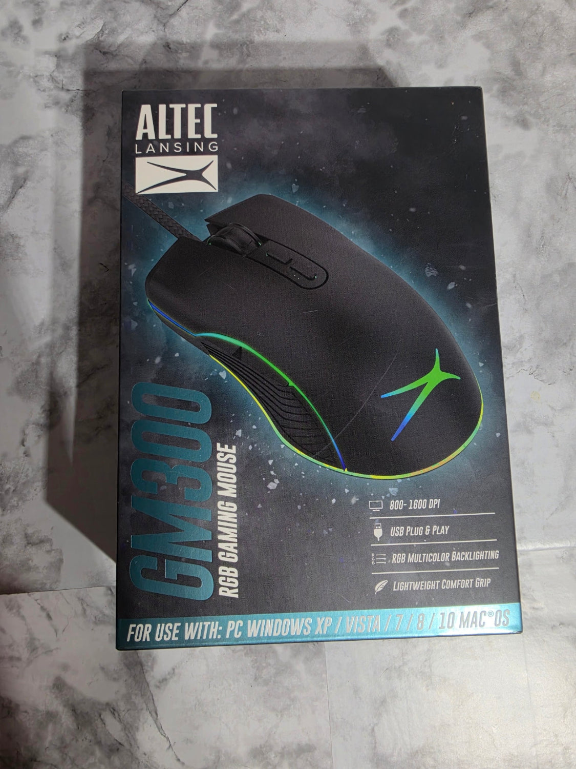 Altec Lansing RGB gaming mouse box on a gray marble surface