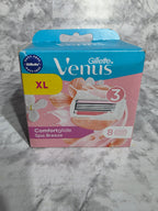 Gillette Venus razor packaging on a marble surface