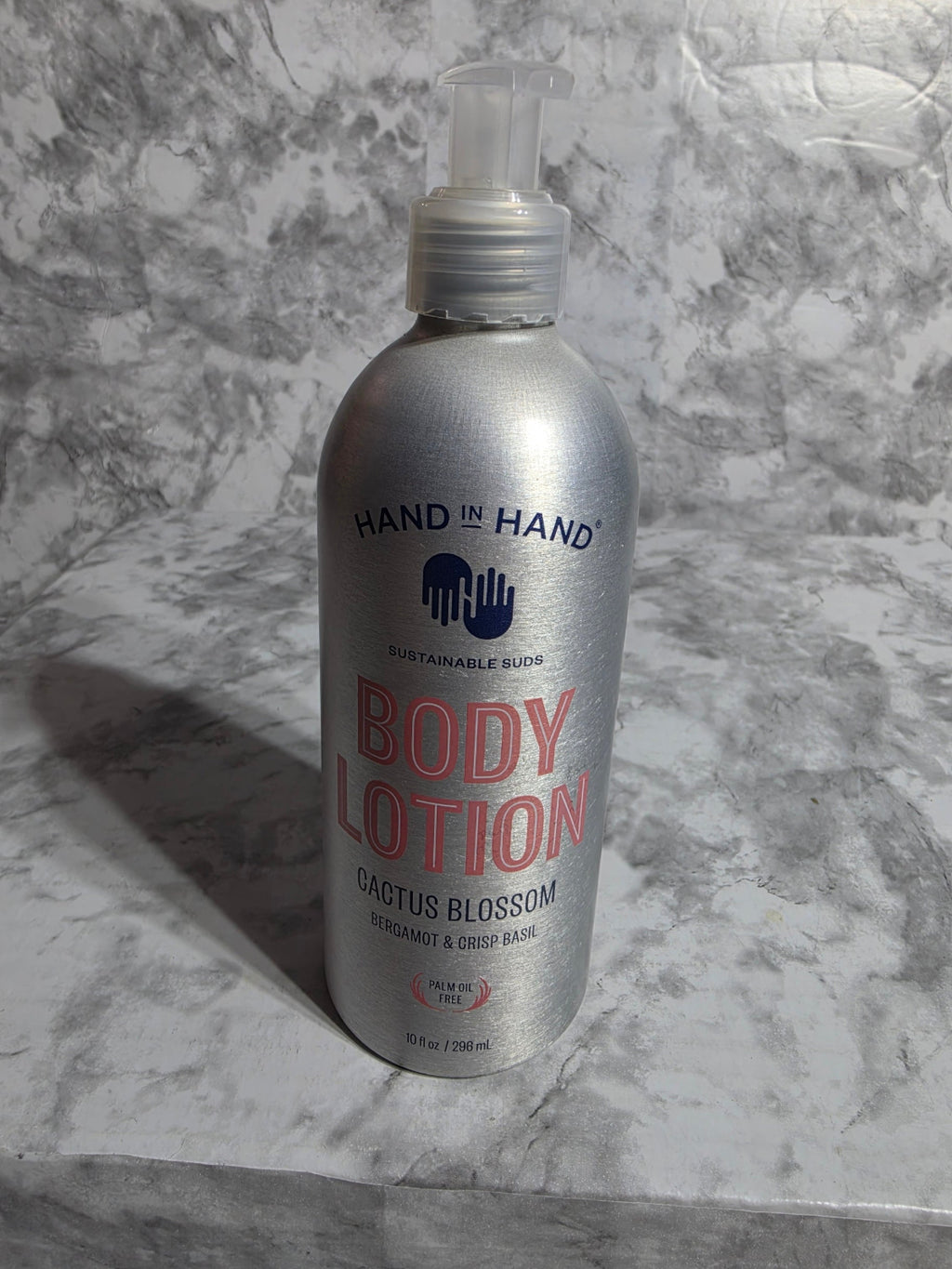 Body lotion bottle on a marble surface