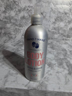 Body lotion bottle on a marble surface