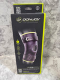 DonJoy Performance knee brace packaging on a marble surface