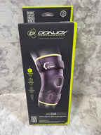 DonJoy Performance knee brace packaging on a marble surface
