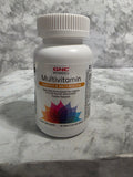 GNC multivitamin bottle on a marble surface