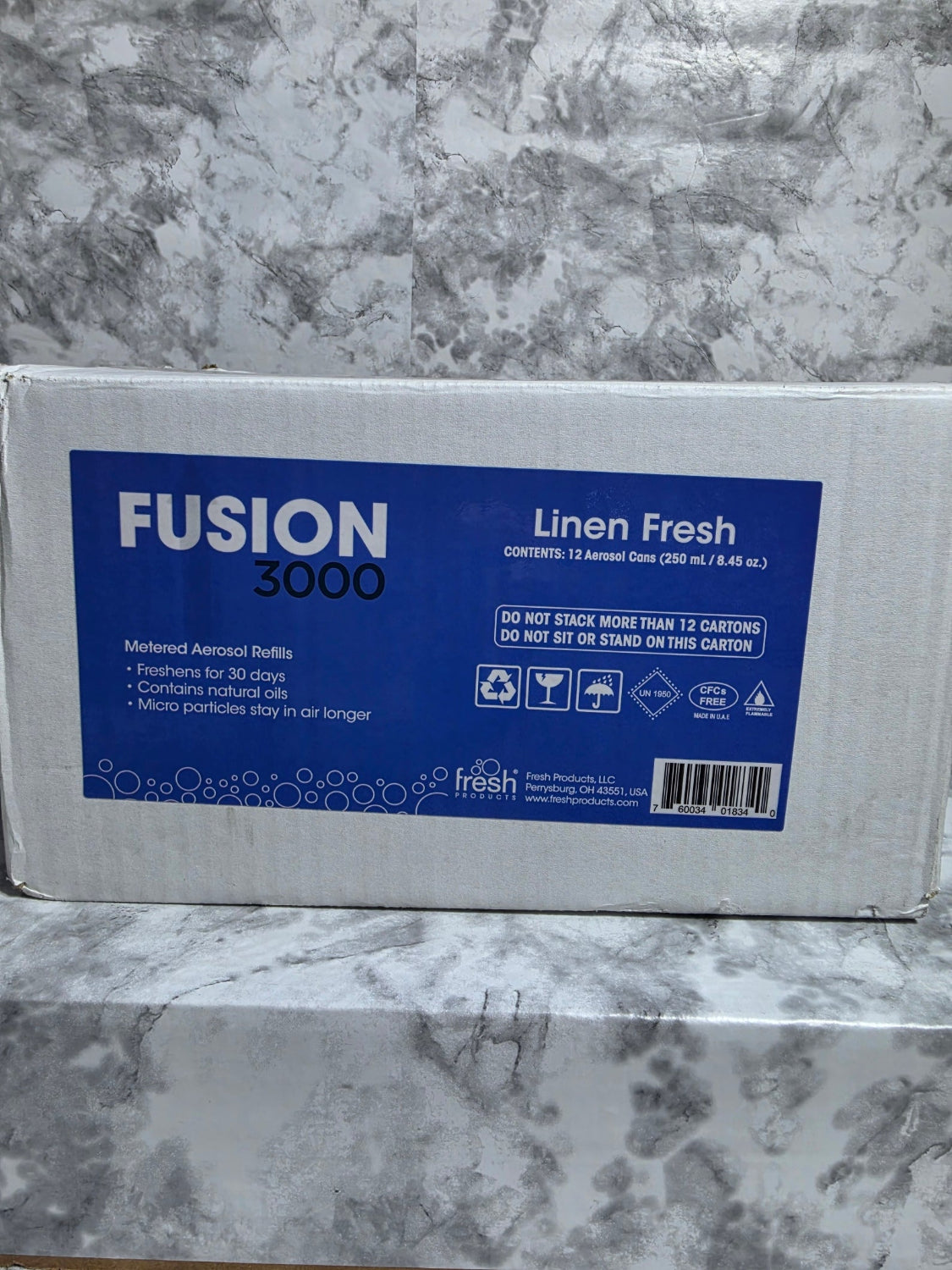 Box of Fusion 3000 Linen Fresh on a marble surface