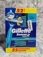 Box of Gillette Sensor 2 Plus disposable razors on a marble surface