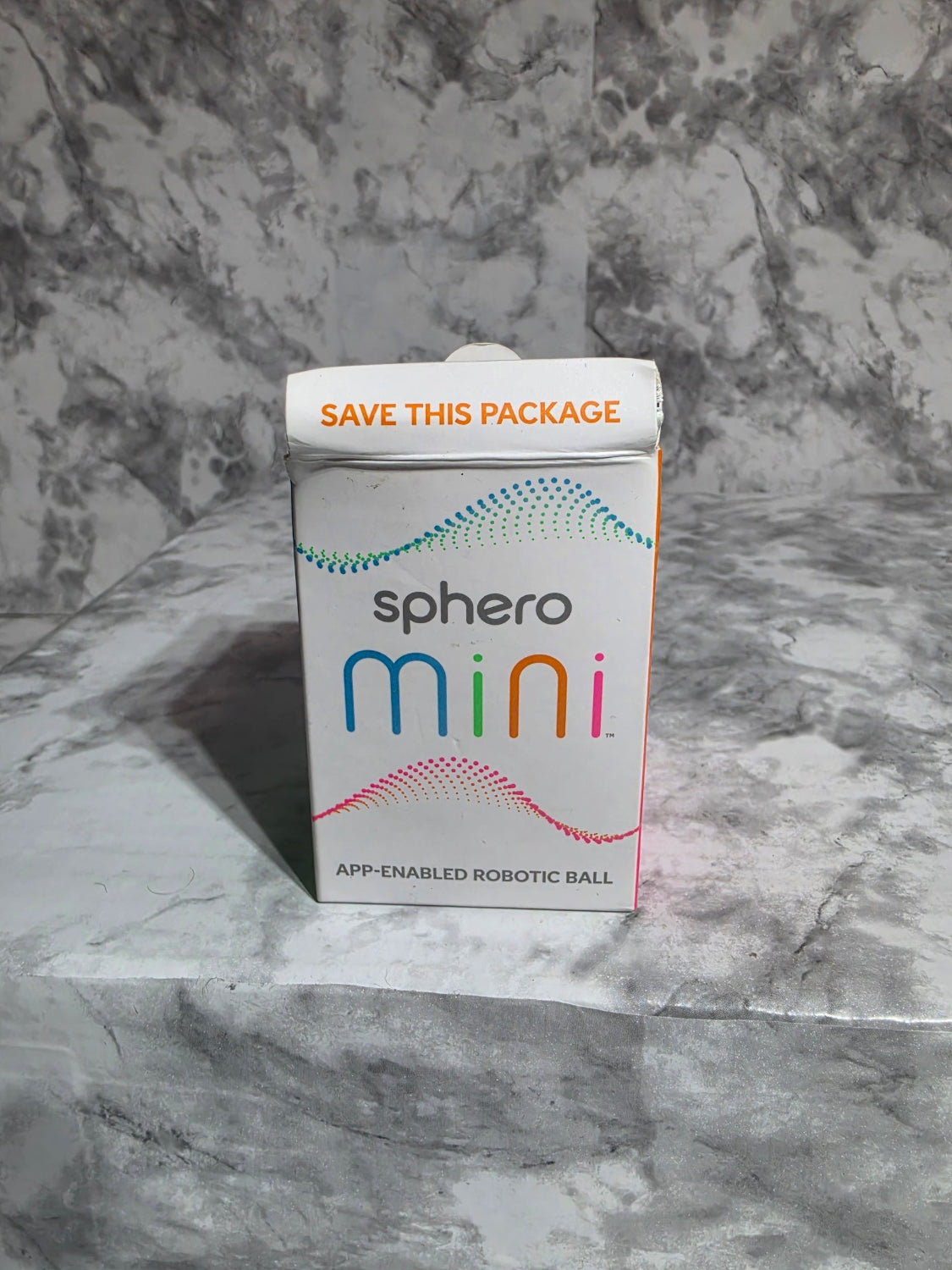 Sphero Mini packaging on a marble surface