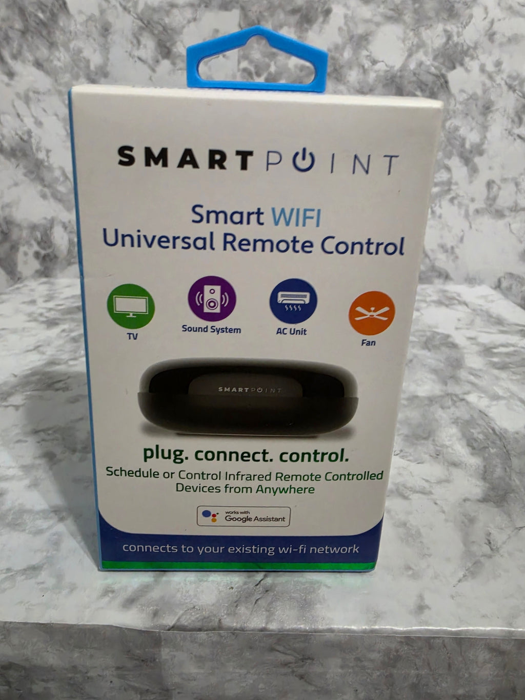SmartPoint smart WiFi universal remote control packaging on a marble surface