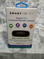 SmartPoint smart WiFi universal remote control packaging on a marble surface