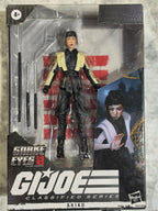 G.I. Joe action figure in packaging with character image on a textured surface
