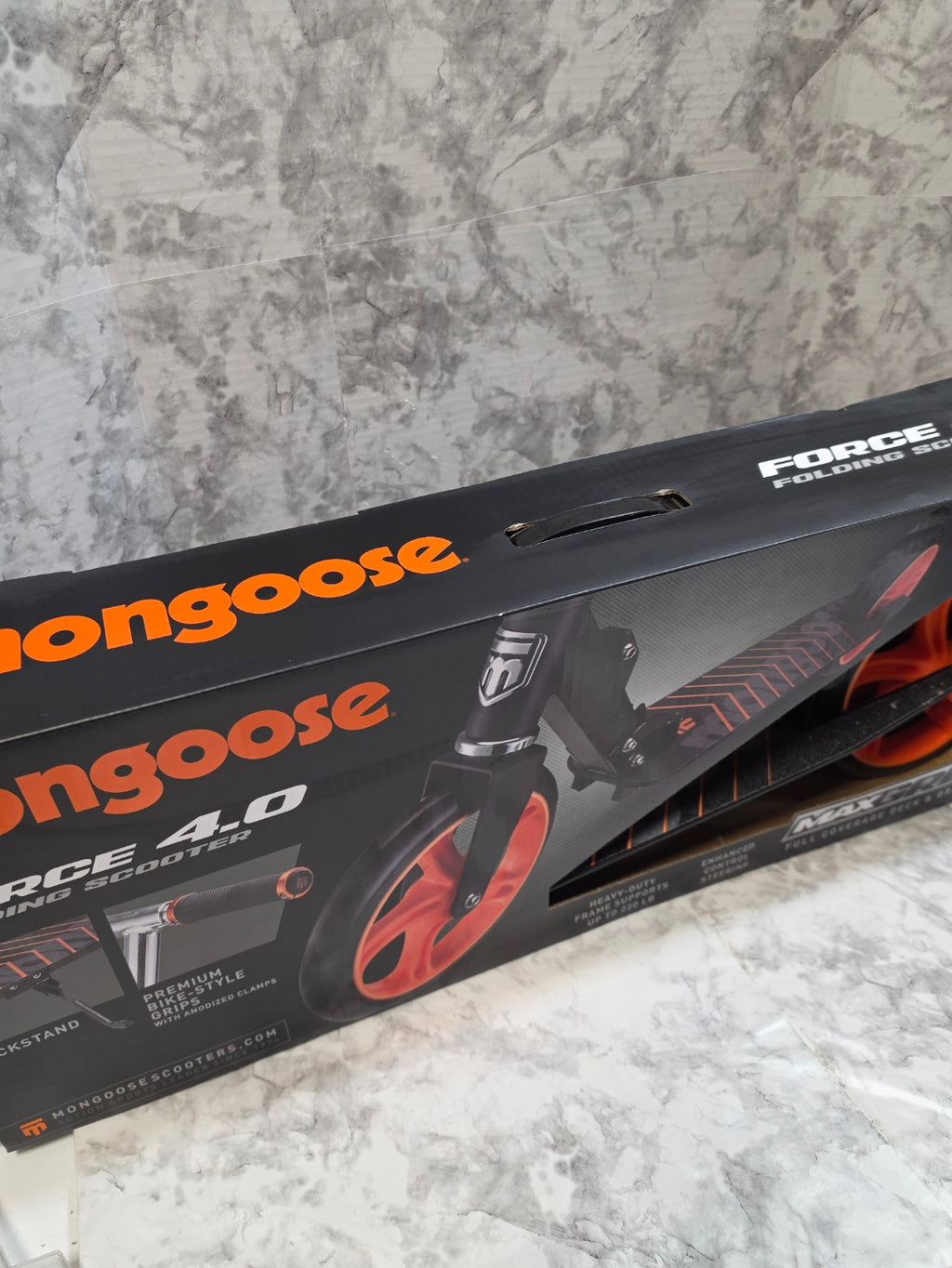 Longboard with 'Long Goose' branding on a gray surface