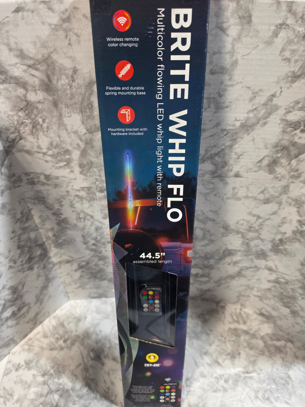 Brite Whip Flo LED whip light packaging on a marble surface
