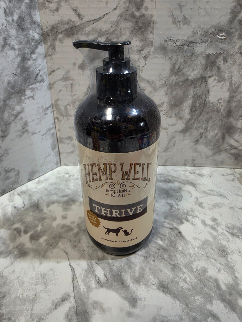 Bottle with a label on a marble surface