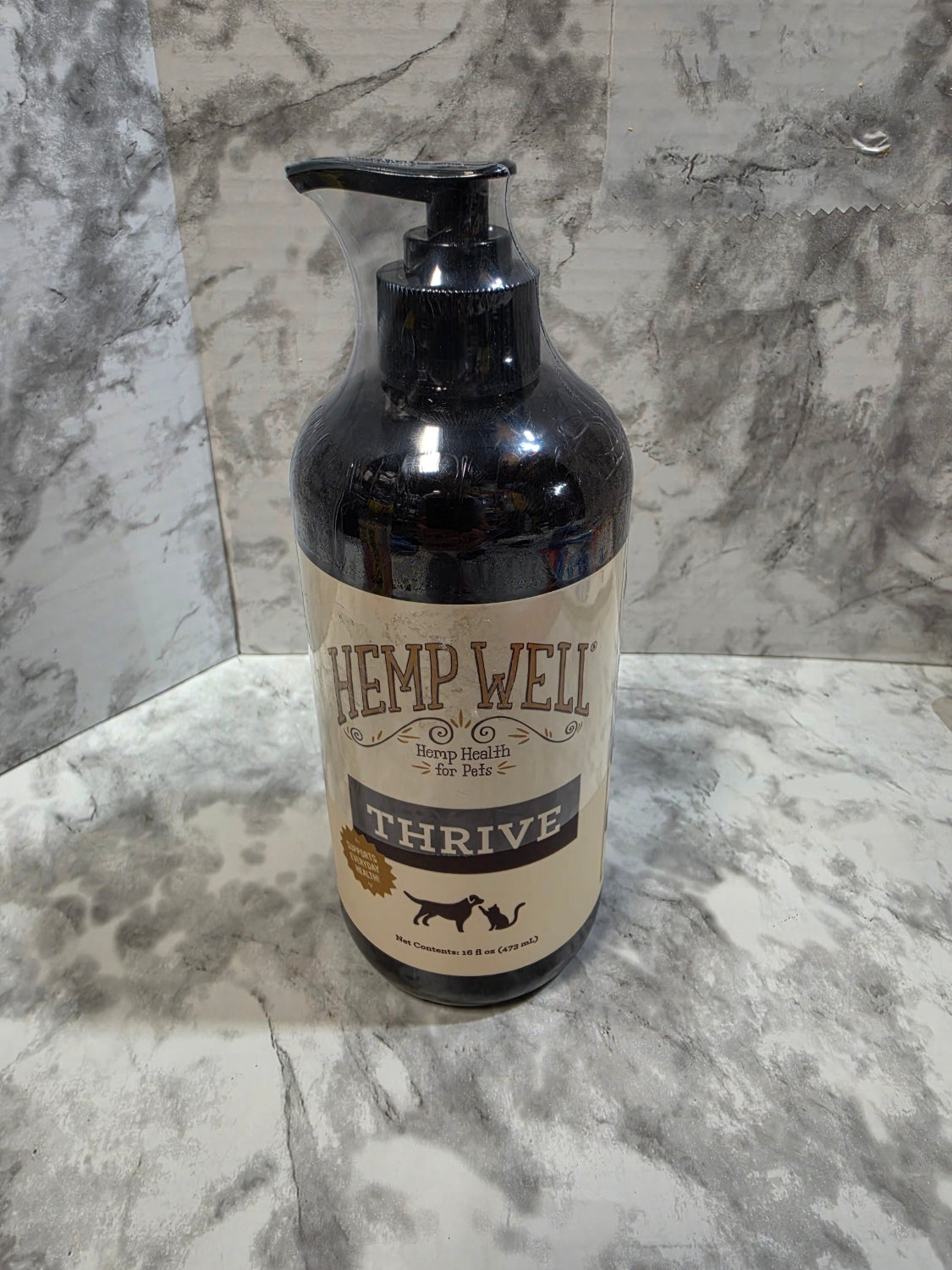 Bottle with a label on a marble surface