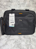 Black suitcase with a visible brand tag on a gray marble surface