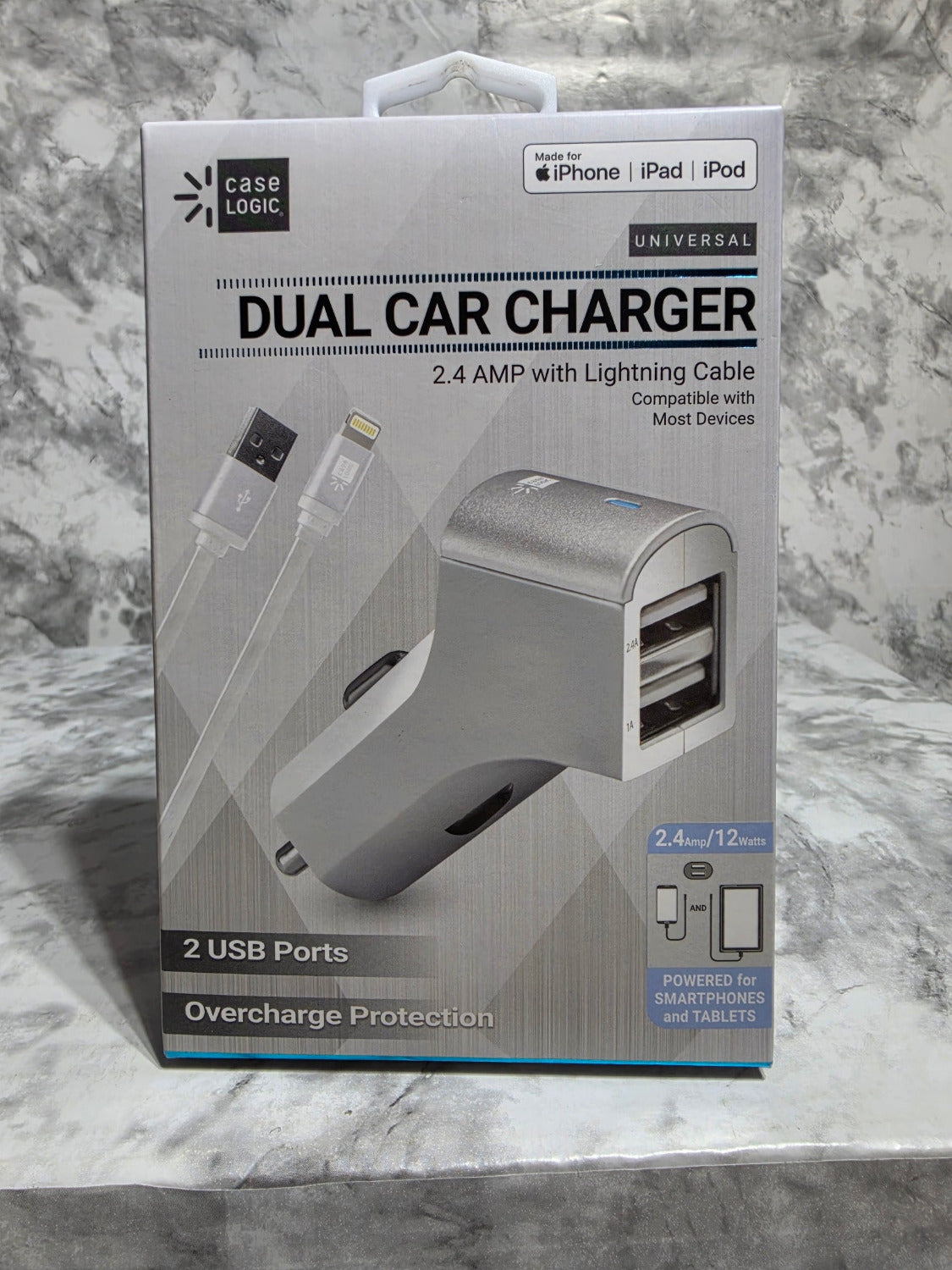 Dual car charger packaging on a marble surface