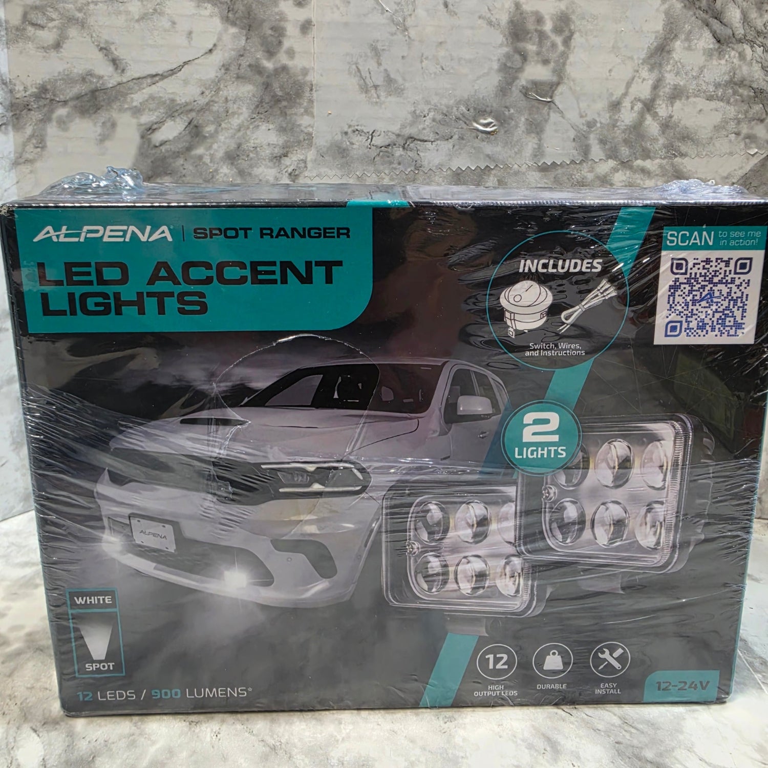 Packaged LED accent lights on a marble surface