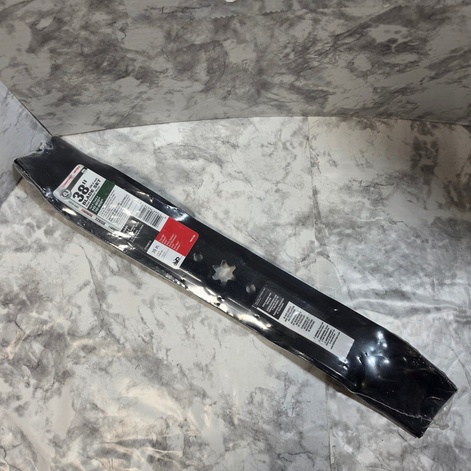 Packaged blade on a marble surface