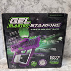 Box of Starfire Gel Blaster with purple and green design on a gray surface