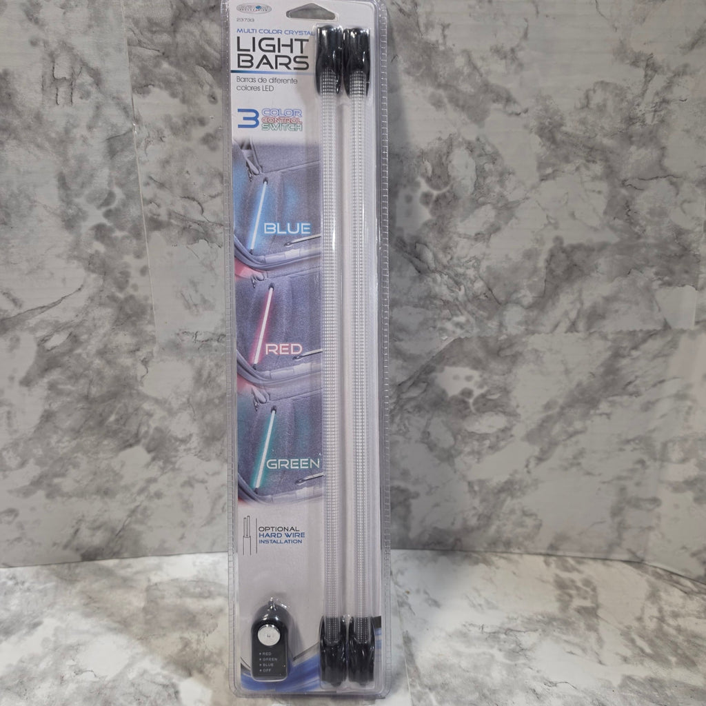 Packaged light bars with blue, red, and green options on a marble surface