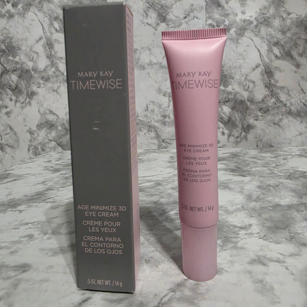 Mary Kay TimeWise eye cream tube and packaging on a marble surface
