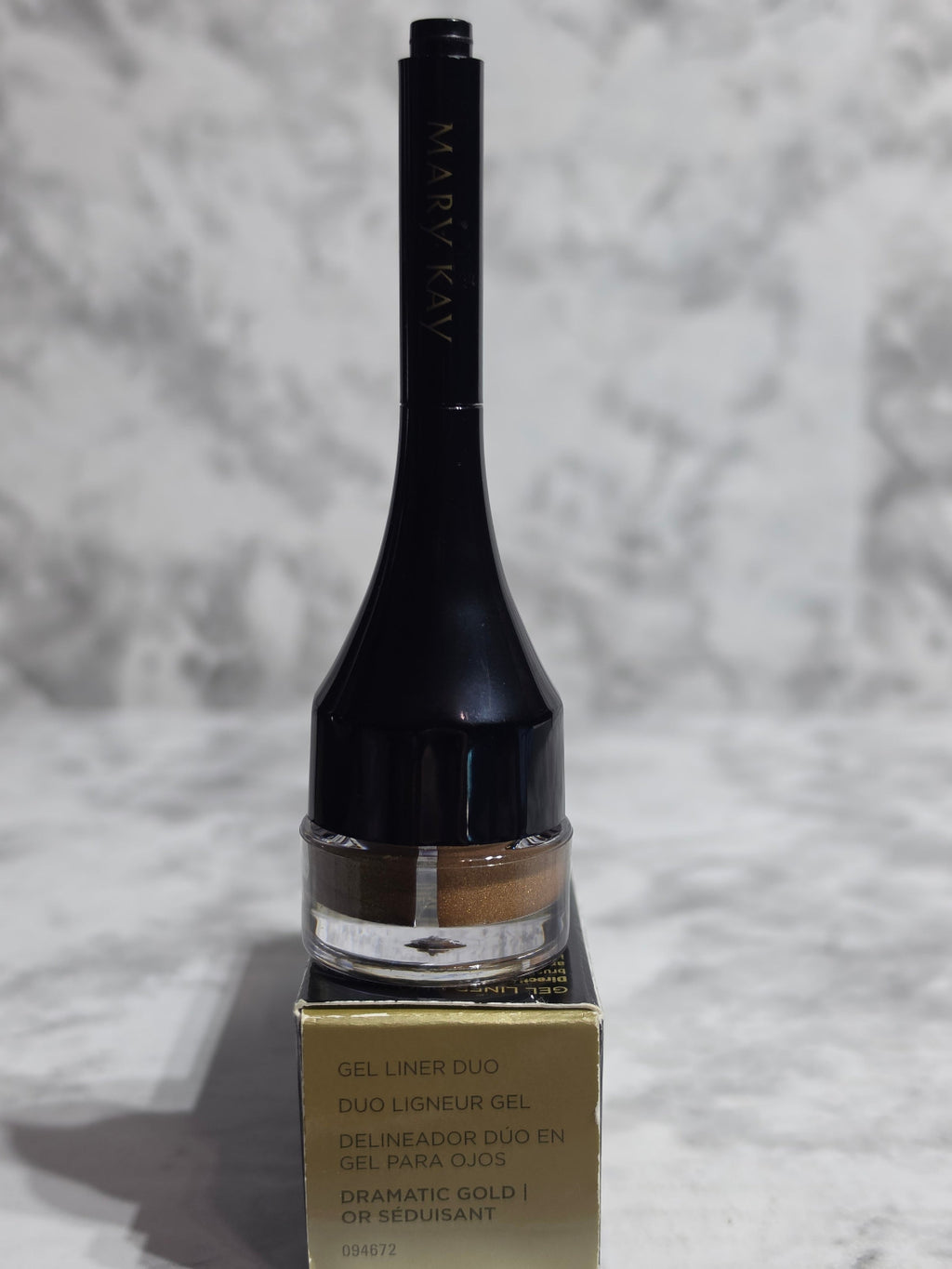 Marvy Kavaii makeup brush on a textured gray background