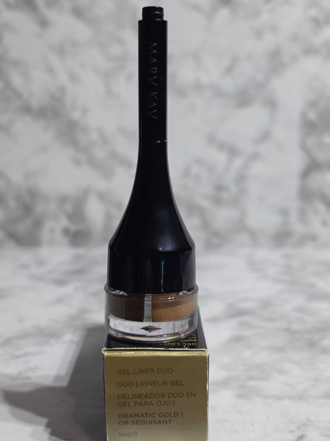 Marvy Kavaii makeup brush on a textured gray background