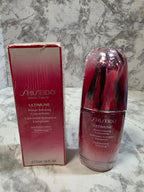 Shiseido Ultimune Power Infusing Concentrate bottle and packaging on a marble surface