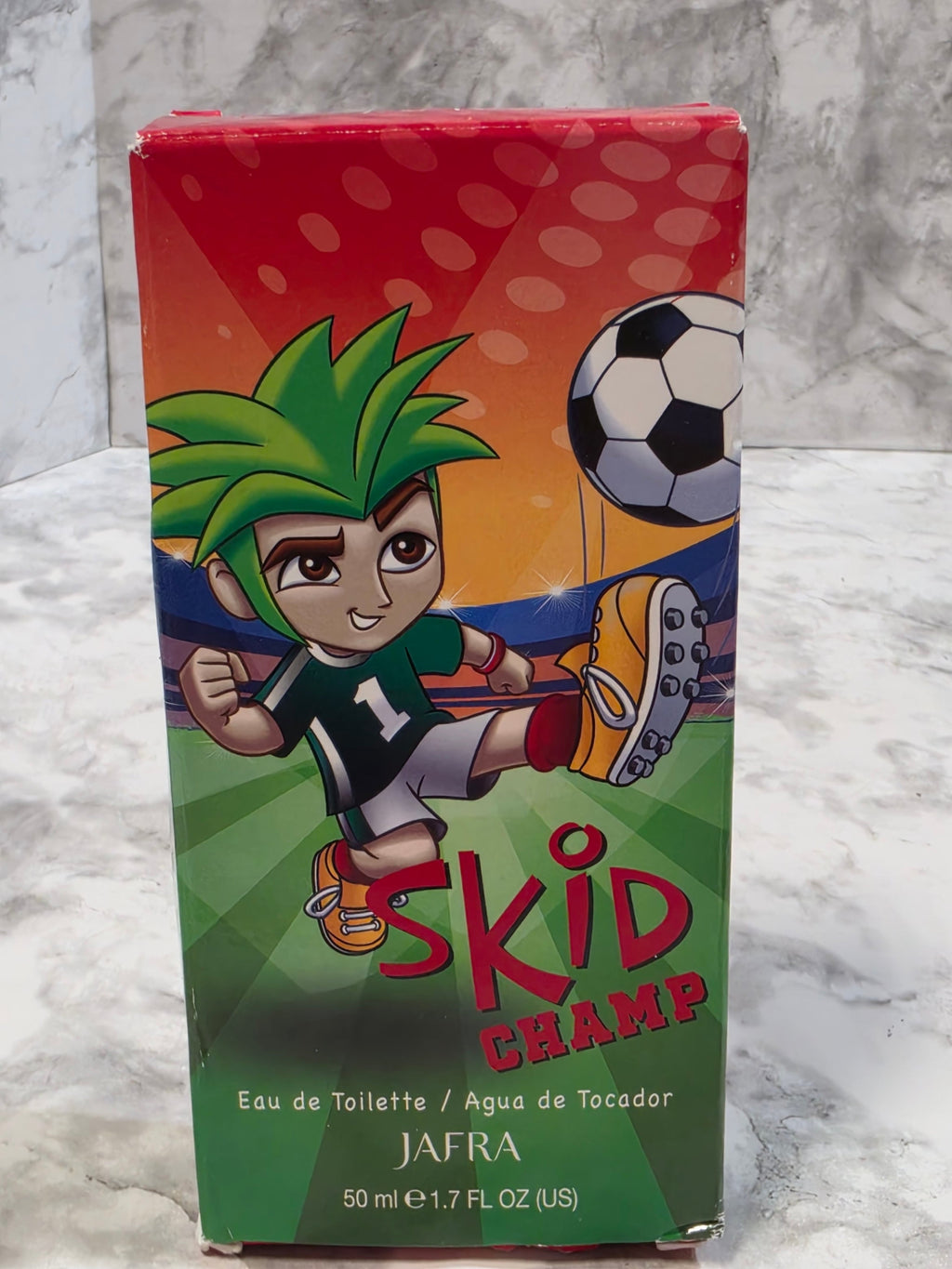 Skid Champ Jafra perfume packaging with a child playing soccer on a colorful background