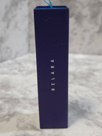 Blue rectangular box with 'BELARA' branding on a marble surface
