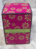 Mary Kay exotic passionfruit product packaging on a textured surface