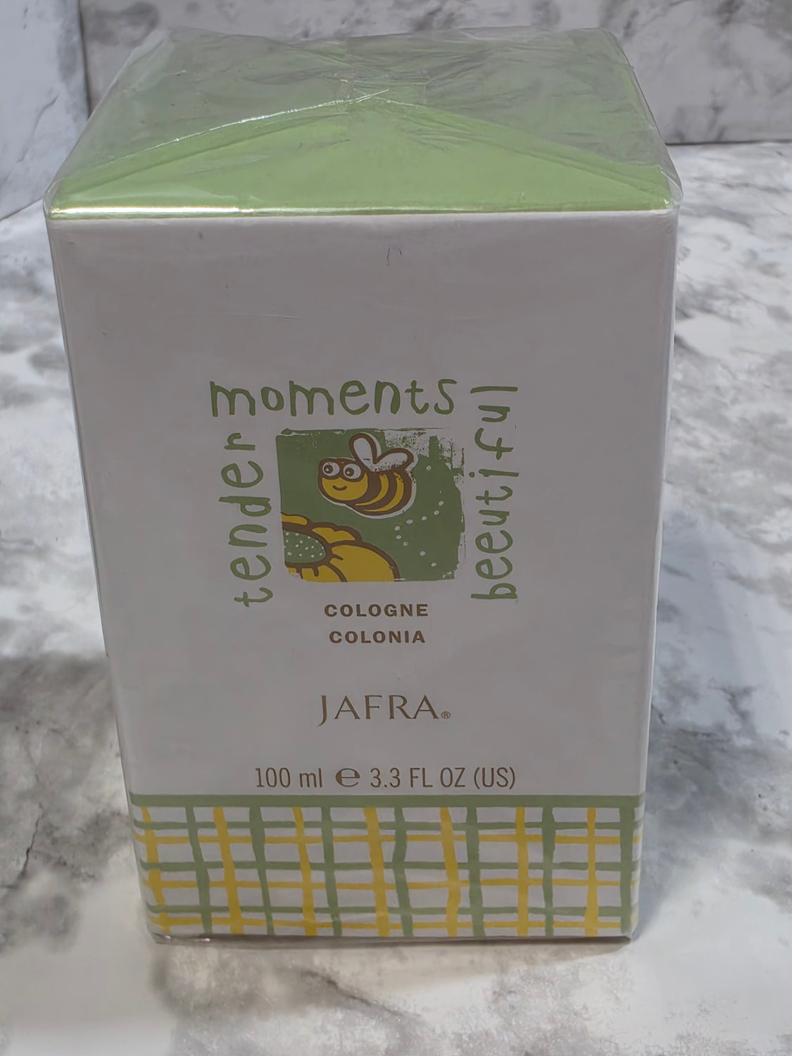 Box of Jafra cologne on a marble surface