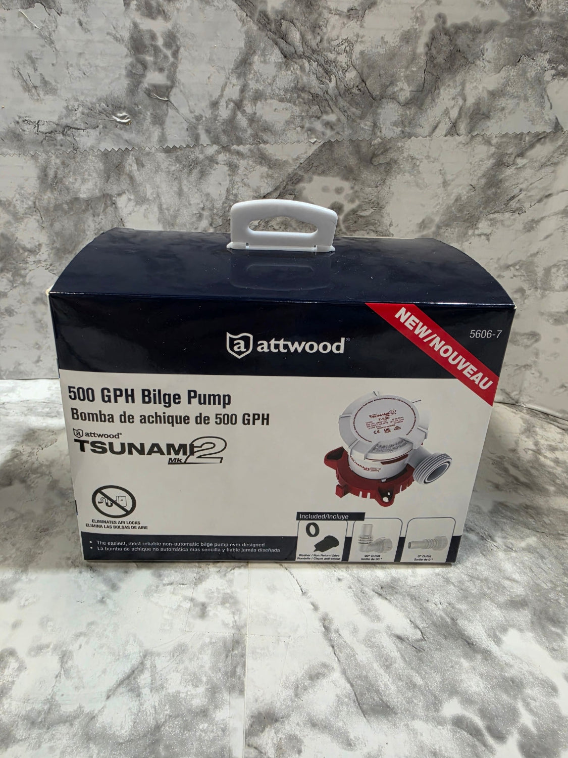 Attwood fish tank pump box on a marble surface