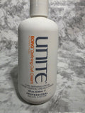 Unite Boing Defining Curl Cream bottle on a marble surface