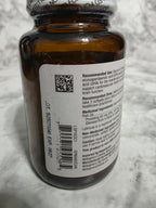 Actual stocked product photo of Metagenics SPM Active 60 softgels back label with UPC and expiration.
