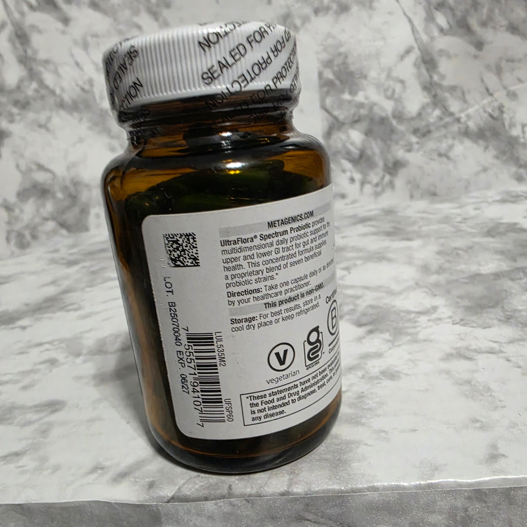 Brown glass bottle with a label on a gray marble surface