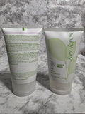 Two Mary Kay skincare products on a marble surface