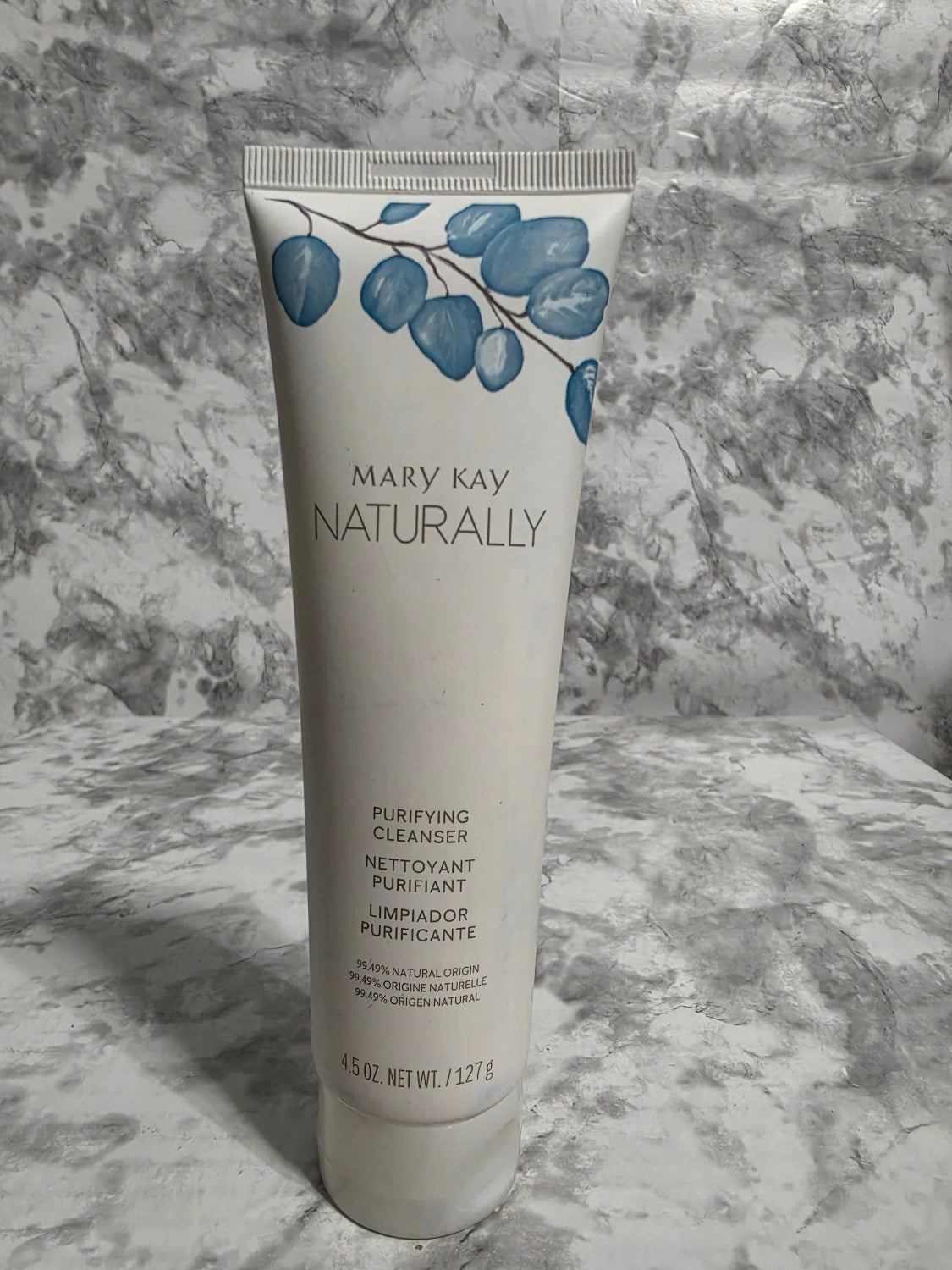 Mary Kay Naturally product on a marble surface
