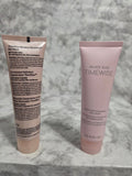 Two skincare tubes from Mary Kay on a marble surface