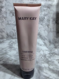 Mary Kay TimeWise 4-in-1 Cleanser 4.5 oz soft pink squeeze tube with black flip-top cap standing upright on grey marble background