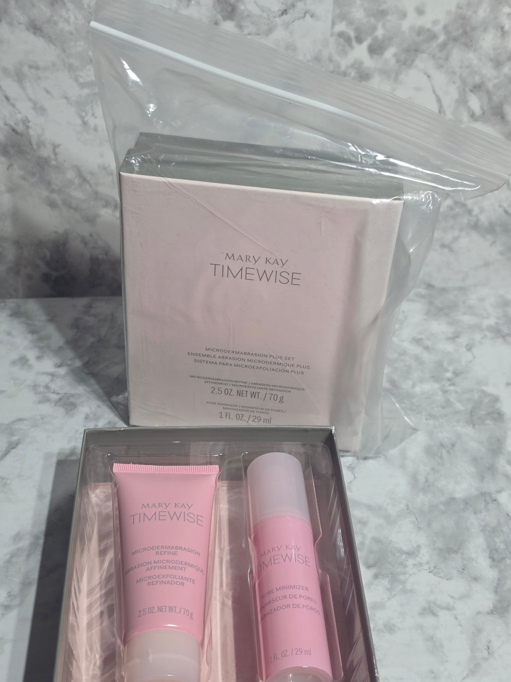 SK-II skincare products on a marble surface