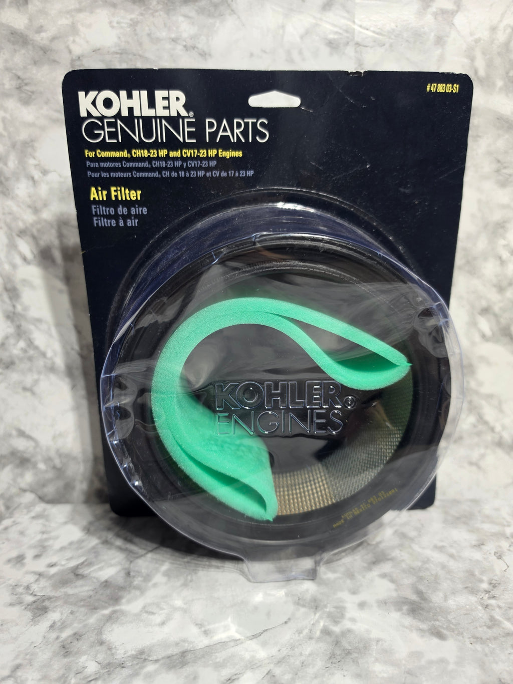 Kohler air filter on a gray marble surface