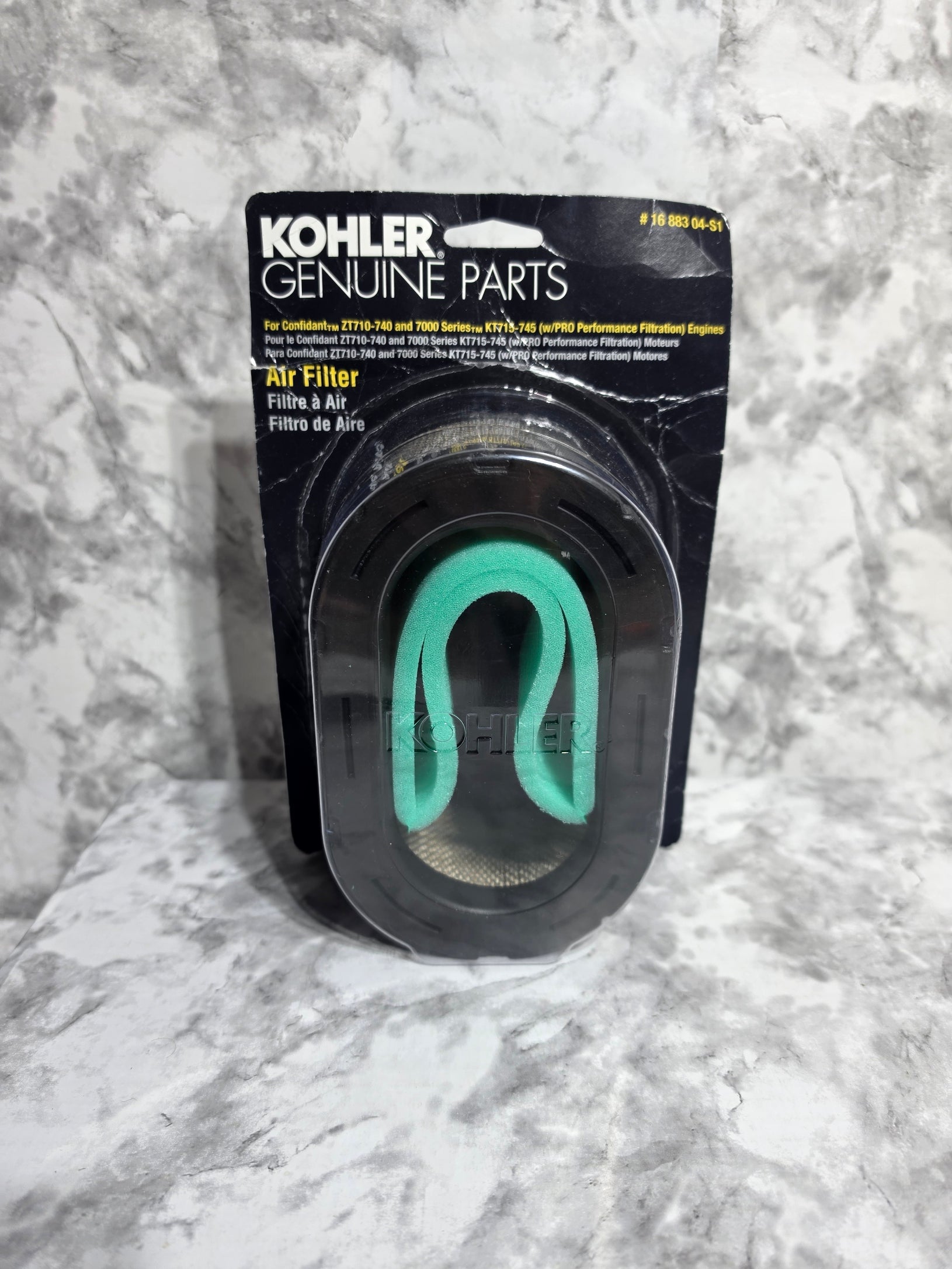 Kohler air filter packaging on a marble surface