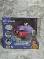 Purple toy with a camera on a gray marble surface