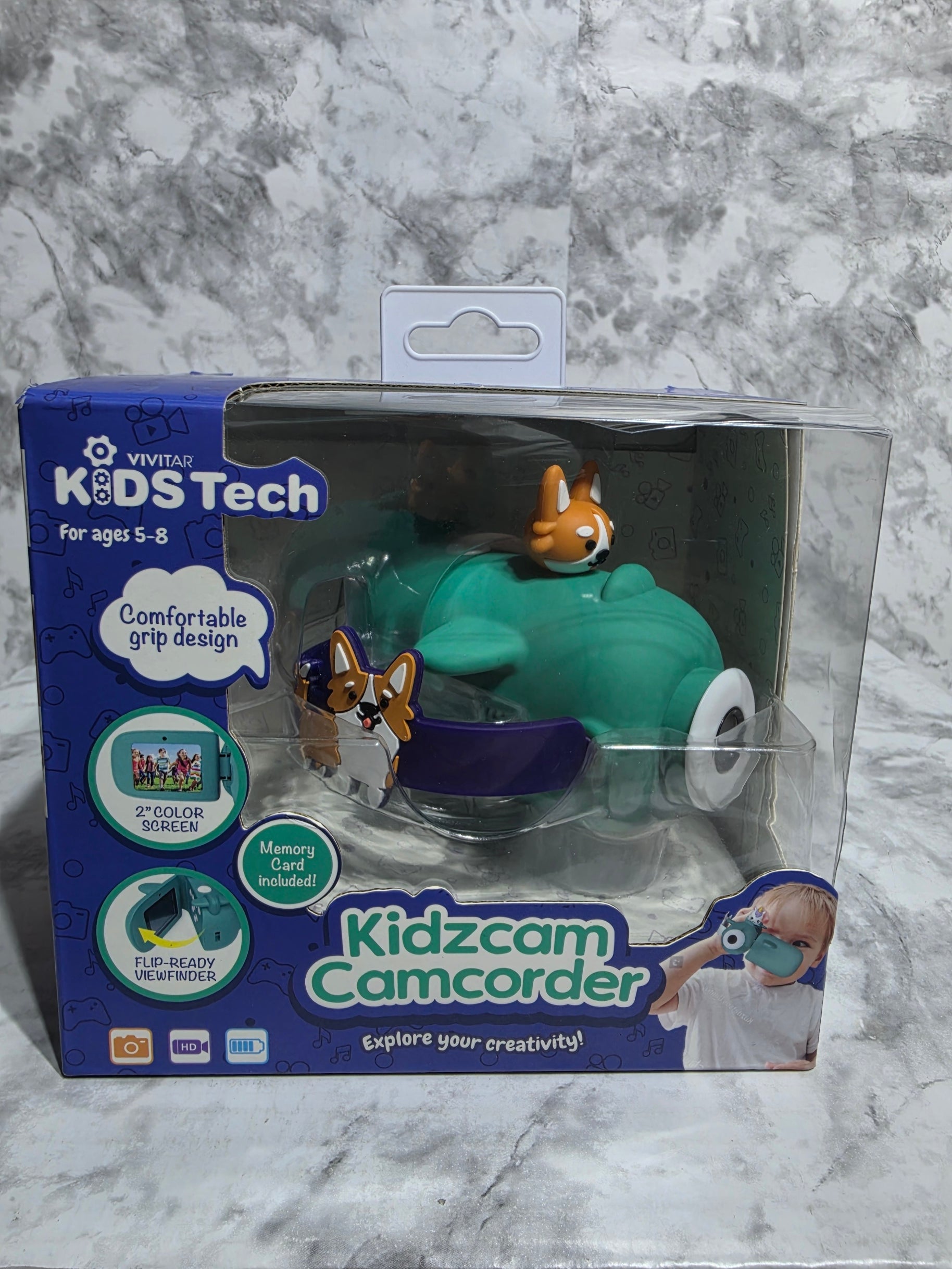 Kidzcam Camcorder toy packaging on a marble surface