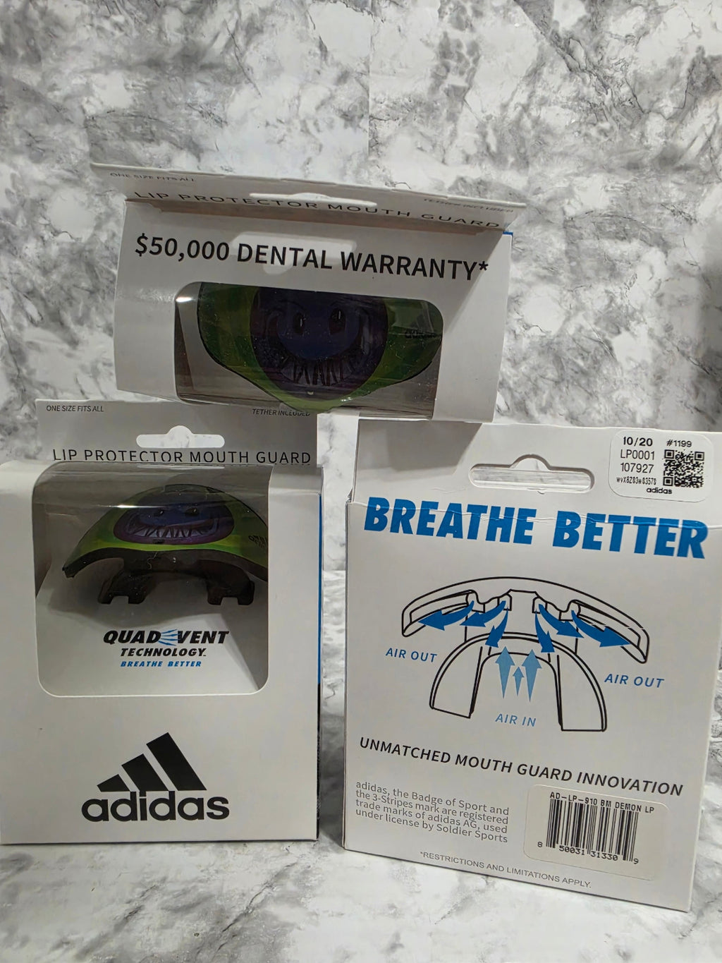 Breathe Better mouthguard packaging with Adidas logo on a marble surface