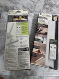 Two packages of a ceiling light fixture on a marble surface