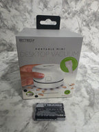 Bytech portable mini desktop vacuum packaging on a marble surface